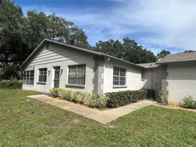 FANTASTIC INVESTMENT OPPORTUNITY TO PICK UP THIS FIXER UPPER IN on Seven Springs Golf and Country Club in Florida - for sale on GolfHomes.com, golf home, golf lot