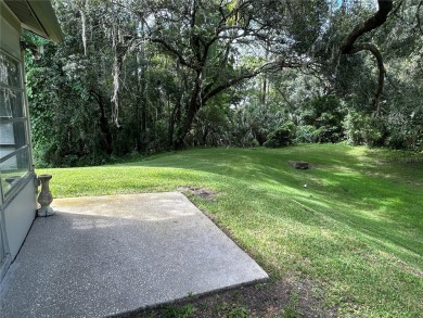 FANTASTIC INVESTMENT OPPORTUNITY TO PICK UP THIS FIXER UPPER IN on Seven Springs Golf and Country Club in Florida - for sale on GolfHomes.com, golf home, golf lot