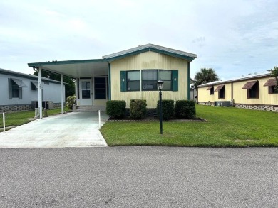 MOTIVATED SELLERS! HOME IS PRICED TO SELL. 2-BEDROOM, 2-BATHROOM on Anglers Green Golf Course in Florida - for sale on GolfHomes.com, golf home, golf lot