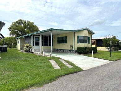 MOTIVATED SELLERS! HOME IS PRICED TO SELL. 2-BEDROOM, 2-BATHROOM on Anglers Green Golf Course in Florida - for sale on GolfHomes.com, golf home, golf lot