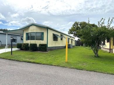MOTIVATED SELLERS! HOME IS PRICED TO SELL. 2-BEDROOM, 2-BATHROOM on Anglers Green Golf Course in Florida - for sale on GolfHomes.com, golf home, golf lot