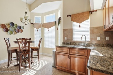 This maintenance-free 3/2/2 villa with pool in Glen Lakes Golf & on Glen Lakes Country Club in Florida - for sale on GolfHomes.com, golf home, golf lot