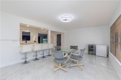 This gorgeous 4 bedroom, 2 bath pool home in the historic Palm on Fort Myers Country Club in Florida - for sale on GolfHomes.com, golf home, golf lot