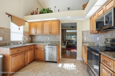 This maintenance-free 3/2/2 villa with pool in Glen Lakes Golf & on Glen Lakes Country Club in Florida - for sale on GolfHomes.com, golf home, golf lot