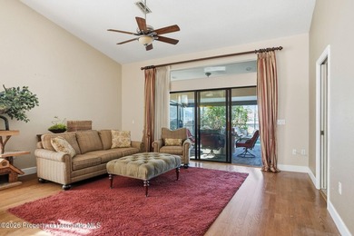 This maintenance-free 3/2/2 villa with pool in Glen Lakes Golf & on Glen Lakes Country Club in Florida - for sale on GolfHomes.com, golf home, golf lot