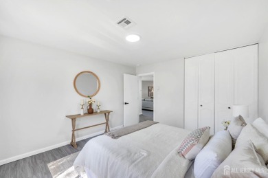 Immaculately renovated end-unit gem in the gated Leisure Village on Greenbriar Woodlands in New Jersey - for sale on GolfHomes.com, golf home, golf lot