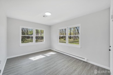 Immaculately renovated end-unit gem in the gated Leisure Village on Greenbriar Woodlands in New Jersey - for sale on GolfHomes.com, golf home, golf lot