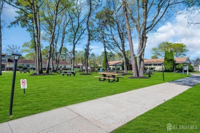 Immaculately renovated end-unit gem in the gated Leisure Village on Greenbriar Woodlands in New Jersey - for sale on GolfHomes.com, golf home, golf lot