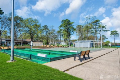 Immaculately renovated end-unit gem in the gated Leisure Village on Greenbriar Woodlands in New Jersey - for sale on GolfHomes.com, golf home, golf lot
