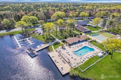 Immaculately renovated end-unit gem in the gated Leisure Village on Greenbriar Woodlands in New Jersey - for sale on GolfHomes.com, golf home, golf lot