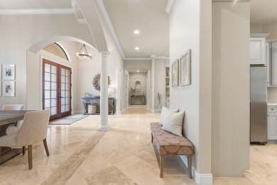 Updated, custom-built home nestled within the highly desirable on Regatta Bay Golf and Country Club in Florida - for sale on GolfHomes.com, golf home, golf lot