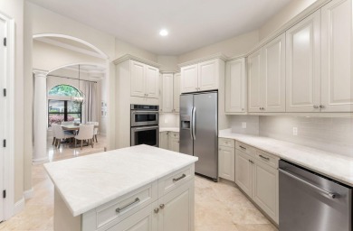Updated, custom-built home nestled within the highly desirable on Regatta Bay Golf and Country Club in Florida - for sale on GolfHomes.com, golf home, golf lot