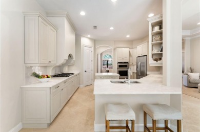 Updated, custom-built home nestled within the highly desirable on Regatta Bay Golf and Country Club in Florida - for sale on GolfHomes.com, golf home, golf lot