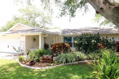 There is so much to love about this beautiful 3 bedroom, 2 bath on The Dunedin Country Club in Florida - for sale on GolfHomes.com, golf home, golf lot