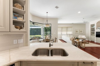 Updated, custom-built home nestled within the highly desirable on Regatta Bay Golf and Country Club in Florida - for sale on GolfHomes.com, golf home, golf lot
