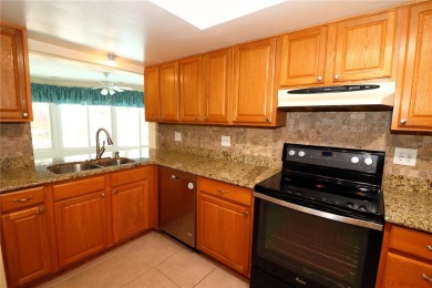 There is so much to love about this beautiful 3 bedroom, 2 bath on The Dunedin Country Club in Florida - for sale on GolfHomes.com, golf home, golf lot