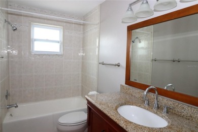 There is so much to love about this beautiful 3 bedroom, 2 bath on The Dunedin Country Club in Florida - for sale on GolfHomes.com, golf home, golf lot