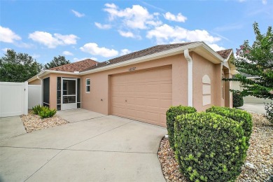 IMMACULATE, TURNKEY 3/2 BLOCK and STUCCO courtyard villa with on The Links of Spruce Creek in Florida - for sale on GolfHomes.com, golf home, golf lot