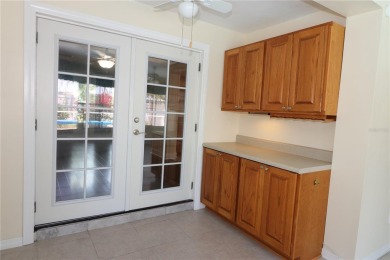 There is so much to love about this beautiful 3 bedroom, 2 bath on The Dunedin Country Club in Florida - for sale on GolfHomes.com, golf home, golf lot
