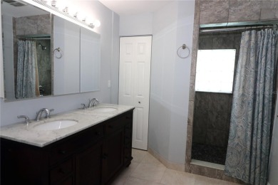 There is so much to love about this beautiful 3 bedroom, 2 bath on The Dunedin Country Club in Florida - for sale on GolfHomes.com, golf home, golf lot