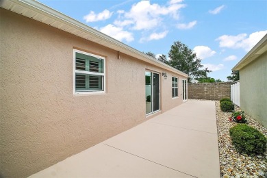 IMMACULATE, TURNKEY 3/2 BLOCK and STUCCO courtyard villa with on The Links of Spruce Creek in Florida - for sale on GolfHomes.com, golf home, golf lot
