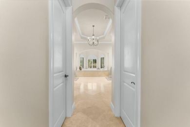 Updated, custom-built home nestled within the highly desirable on Regatta Bay Golf and Country Club in Florida - for sale on GolfHomes.com, golf home, golf lot