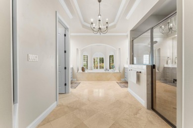 Updated, custom-built home nestled within the highly desirable on Regatta Bay Golf and Country Club in Florida - for sale on GolfHomes.com, golf home, golf lot