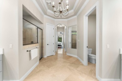 Updated, custom-built home nestled within the highly desirable on Regatta Bay Golf and Country Club in Florida - for sale on GolfHomes.com, golf home, golf lot