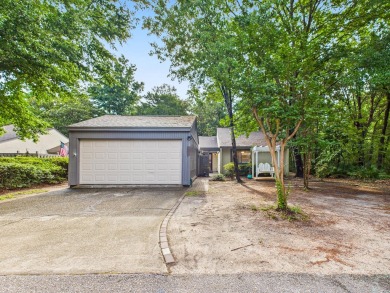 Secluded and beautifully updated, this charming 2-bedroom on Fairway Oaks at Magnolia Golf Course in Florida - for sale on GolfHomes.com, golf home, golf lot