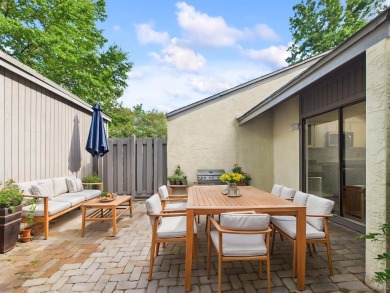 Secluded and beautifully updated, this charming 2-bedroom on Fairway Oaks at Magnolia Golf Course in Florida - for sale on GolfHomes.com, golf home, golf lot