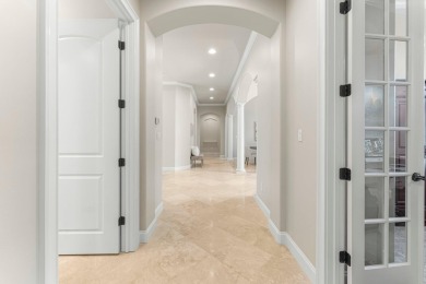 Updated, custom-built home nestled within the highly desirable on Regatta Bay Golf and Country Club in Florida - for sale on GolfHomes.com, golf home, golf lot