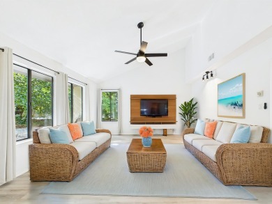 Secluded and beautifully updated, this charming 2-bedroom on Fairway Oaks at Magnolia Golf Course in Florida - for sale on GolfHomes.com, golf home, golf lot