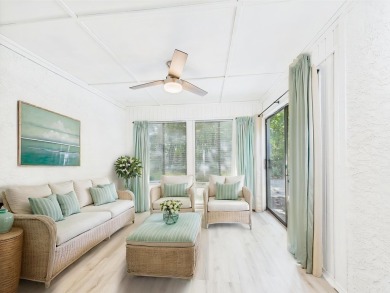 Secluded and beautifully updated, this charming 2-bedroom on Fairway Oaks at Magnolia Golf Course in Florida - for sale on GolfHomes.com, golf home, golf lot