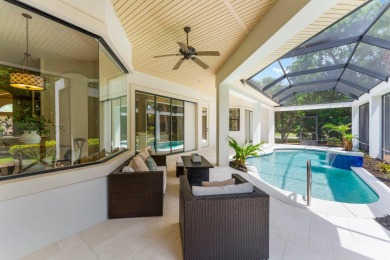 Updated, custom-built home nestled within the highly desirable on Regatta Bay Golf and Country Club in Florida - for sale on GolfHomes.com, golf home, golf lot