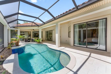 Updated, custom-built home nestled within the highly desirable on Regatta Bay Golf and Country Club in Florida - for sale on GolfHomes.com, golf home, golf lot