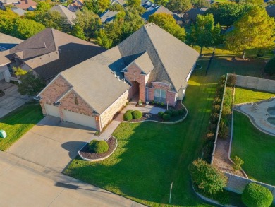 Find your elevated lifestyle in this captivating, single-story on Wildhorse Golf Club of Robson Ranch in Texas - for sale on GolfHomes.com, golf home, golf lot