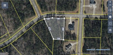 Build your dream home on this beautiful 1.10-acre lot located in on The Club River Forest in Georgia - for sale on GolfHomes.com, golf home, golf lot