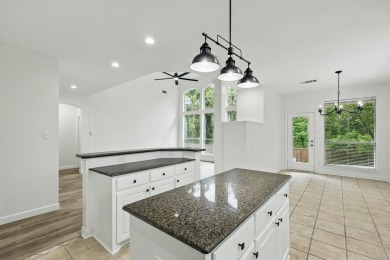 Beautifully and thoughtfully updated, this 4-bedroom, 3-bathroom on Stewart Peninsula Golf Course in Texas - for sale on GolfHomes.com, golf home, golf lot