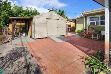 This charming 3-bedroom, 2-bathroom home offers a spacious on Pompano Beach Golf Course  in Florida - for sale on GolfHomes.com, golf home, golf lot