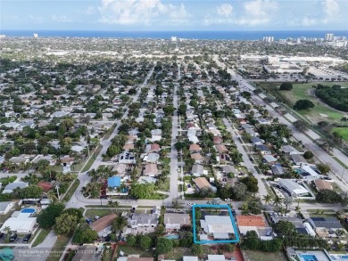 This charming 3-bedroom, 2-bathroom home offers a spacious on Pompano Beach Golf Course  in Florida - for sale on GolfHomes.com, golf home, golf lot