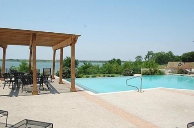 Beautifully and thoughtfully updated, this 4-bedroom, 3-bathroom on Stewart Peninsula Golf Course in Texas - for sale on GolfHomes.com, golf home, golf lot