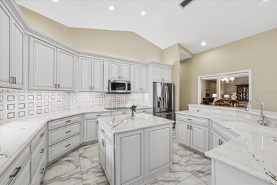 Behind the gates of Crescent Oaks Country Club in picturesque on Crescent Oaks Country Club in Florida - for sale on GolfHomes.com, golf home, golf lot