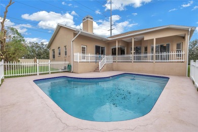 Move-in ready pool home in Long Bayou Estates! This on Seminole Lake Country Club in Florida - for sale on GolfHomes.com, golf home, golf lot