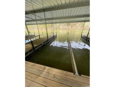 Don't miss this rare opportunity to own a premium lakefront lot on Indian Hills Country Club in Arkansas - for sale on GolfHomes.com, golf home, golf lot