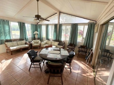 This thoughtfully designed split-floor plan offers privacy on Del Tura Golf and Country Club in Florida - for sale on GolfHomes.com, golf home, golf lot