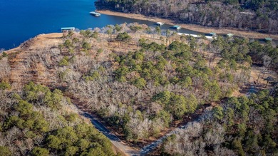 Don't miss this rare opportunity to own a premium lakefront lot on Indian Hills Country Club in Arkansas - for sale on GolfHomes.com, golf home, golf lot
