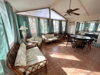 This thoughtfully designed split-floor plan offers privacy on Del Tura Golf and Country Club in Florida - for sale on GolfHomes.com, golf home, golf lot