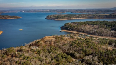 Don't miss this rare opportunity to own a premium lakefront lot on Indian Hills Country Club in Arkansas - for sale on GolfHomes.com, golf home, golf lot