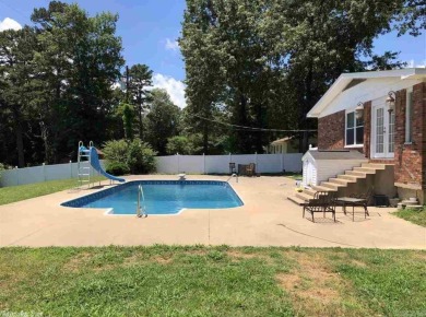 Great Location in town with swimming pool (new liner about 2 on  in Arkansas - for sale on GolfHomes.com, golf home, golf lot