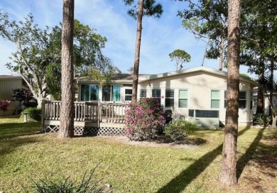 This thoughtfully designed split-floor plan offers privacy on Del Tura Golf and Country Club in Florida - for sale on GolfHomes.com, golf home, golf lot